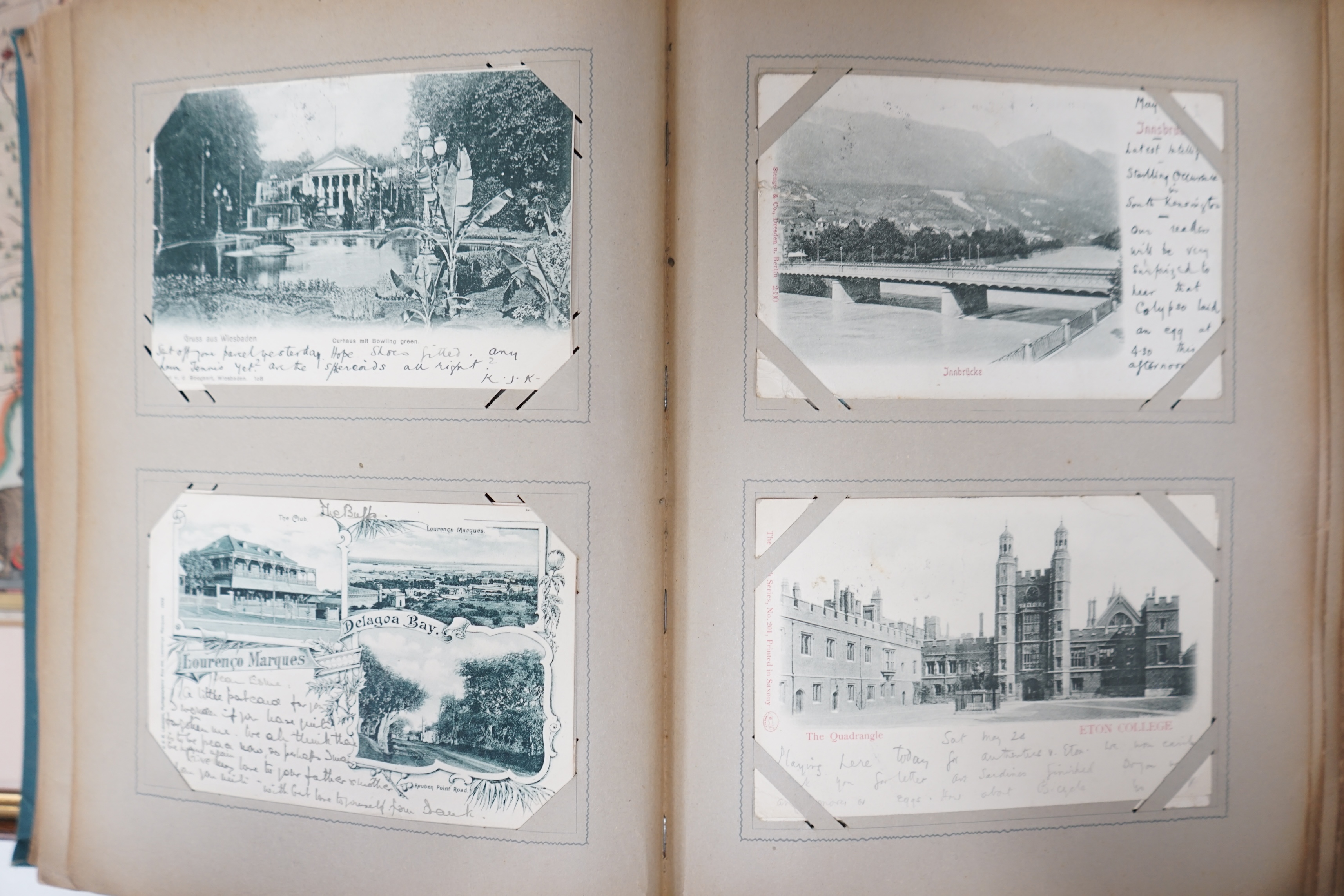 An Edwardian Royal commemorative photograph ‘nautical album’, mostly Royal Navy, leather bound, together with two early 20th century topographical, world and British postcard albums. Condition - good